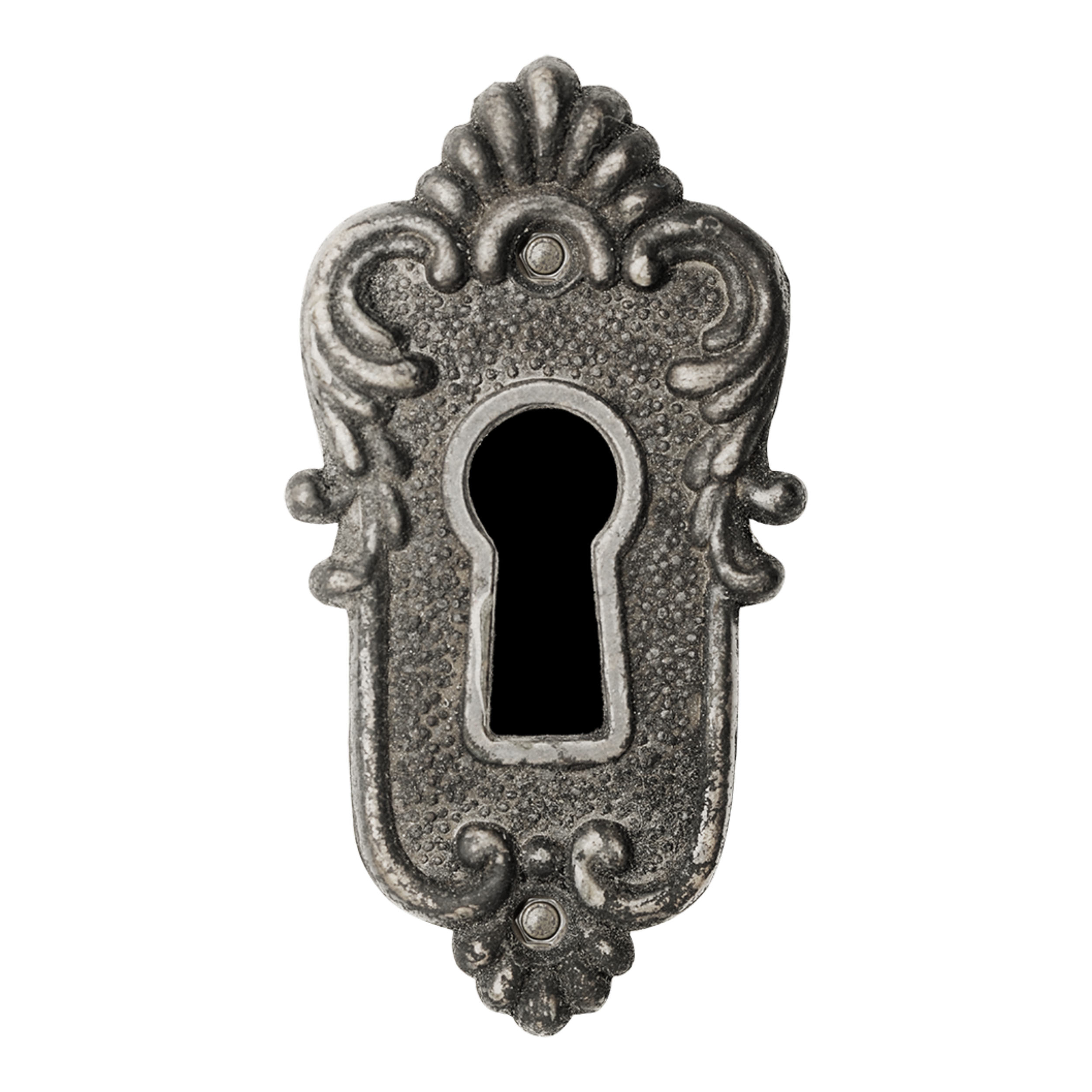 Close up of an ornate metal keyhole cover with decorative filigree design.