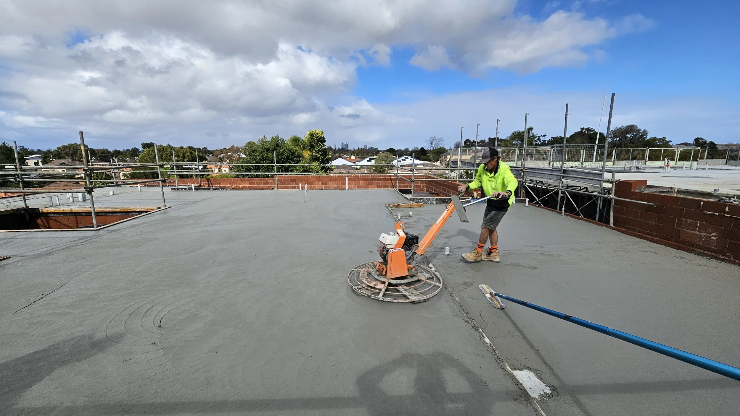 Trowell machine and vibrator for suspended slab in Dianella