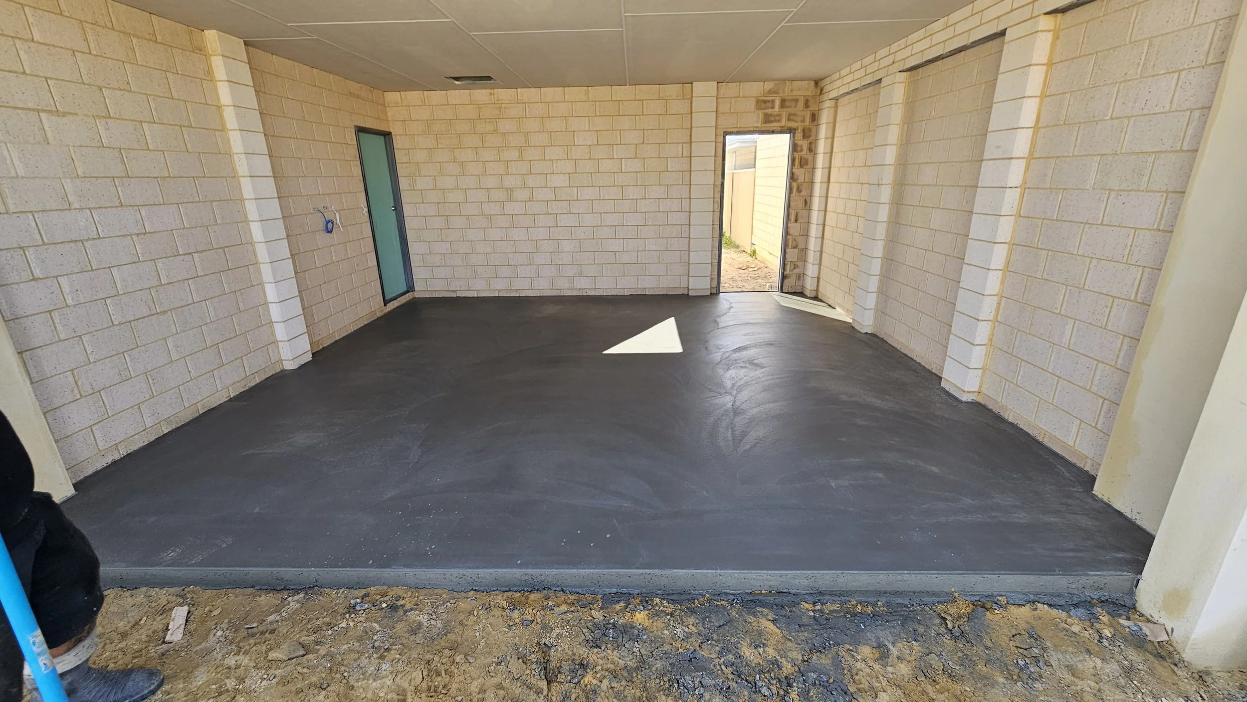 Grey concrete garage in Harrisdale