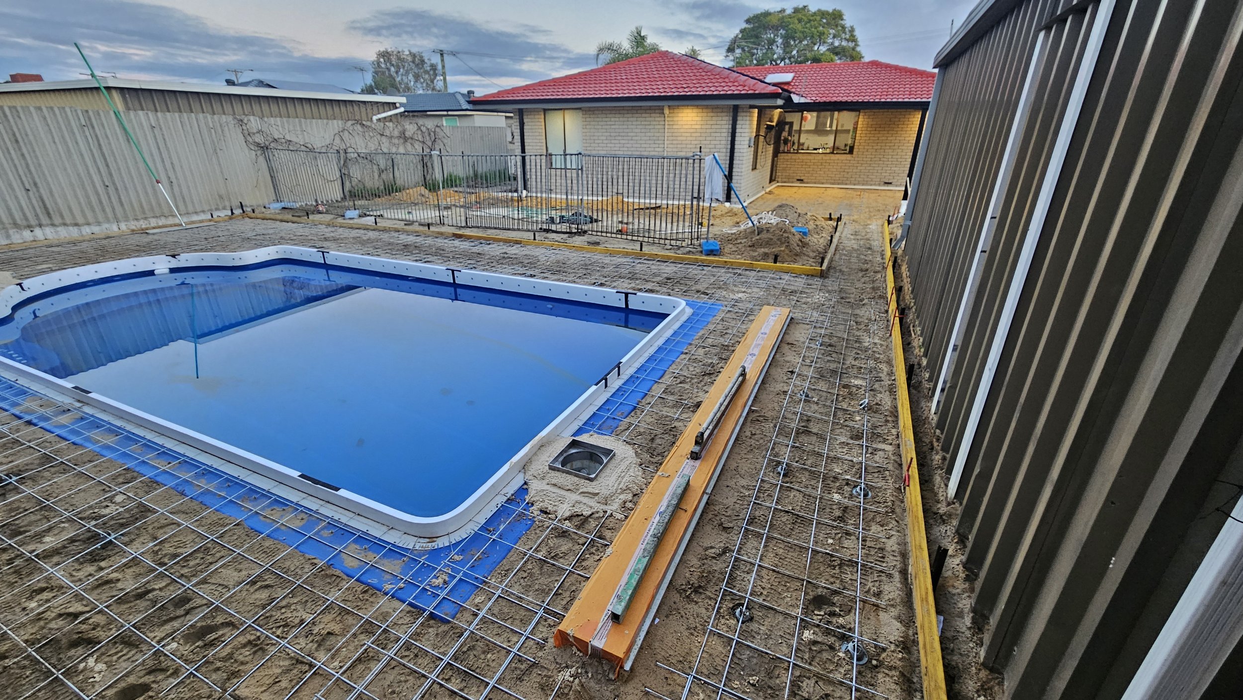 Site preparation and reinforcement for pool surrounds in Forrestfield