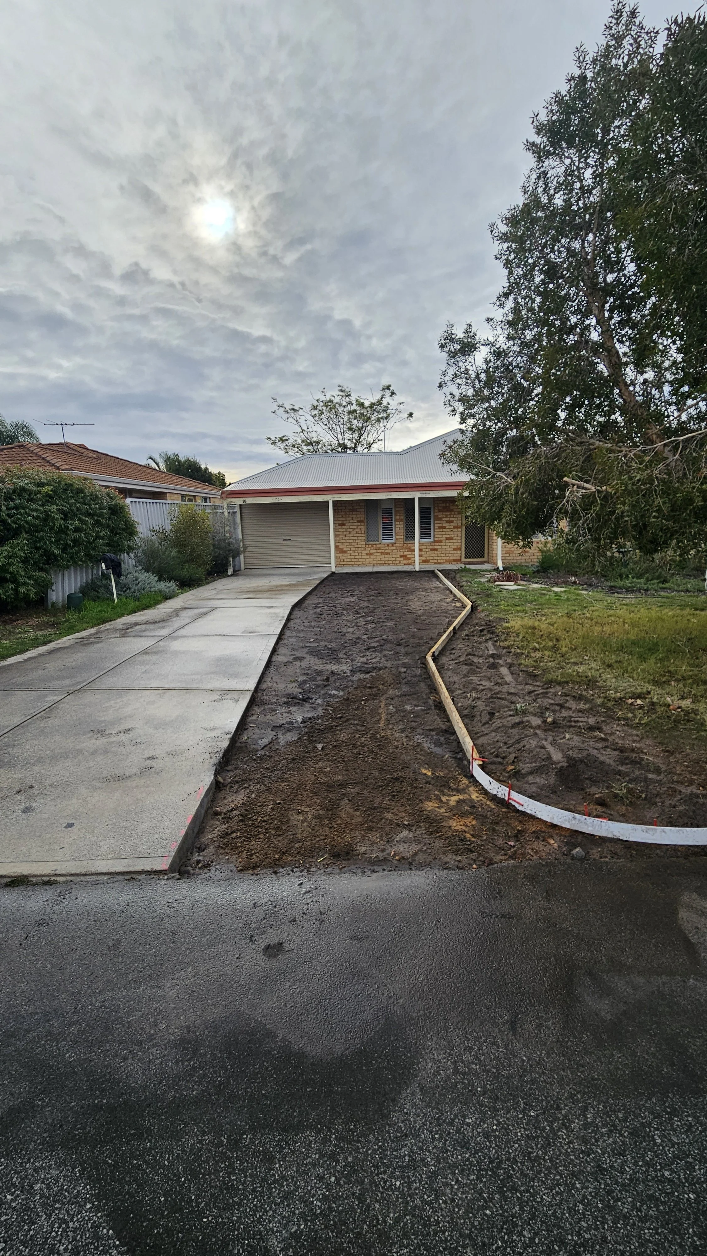 Site preparation formwork for driveway replacement in Ashfield