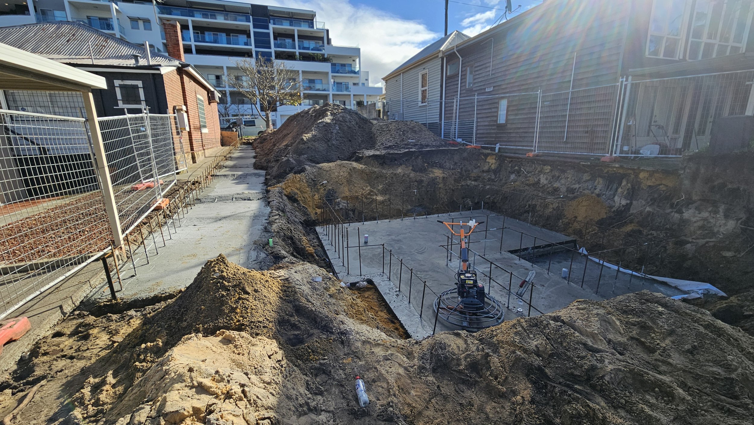 Undercroft slab and lift shaft and retaining wall footings in West Leederville