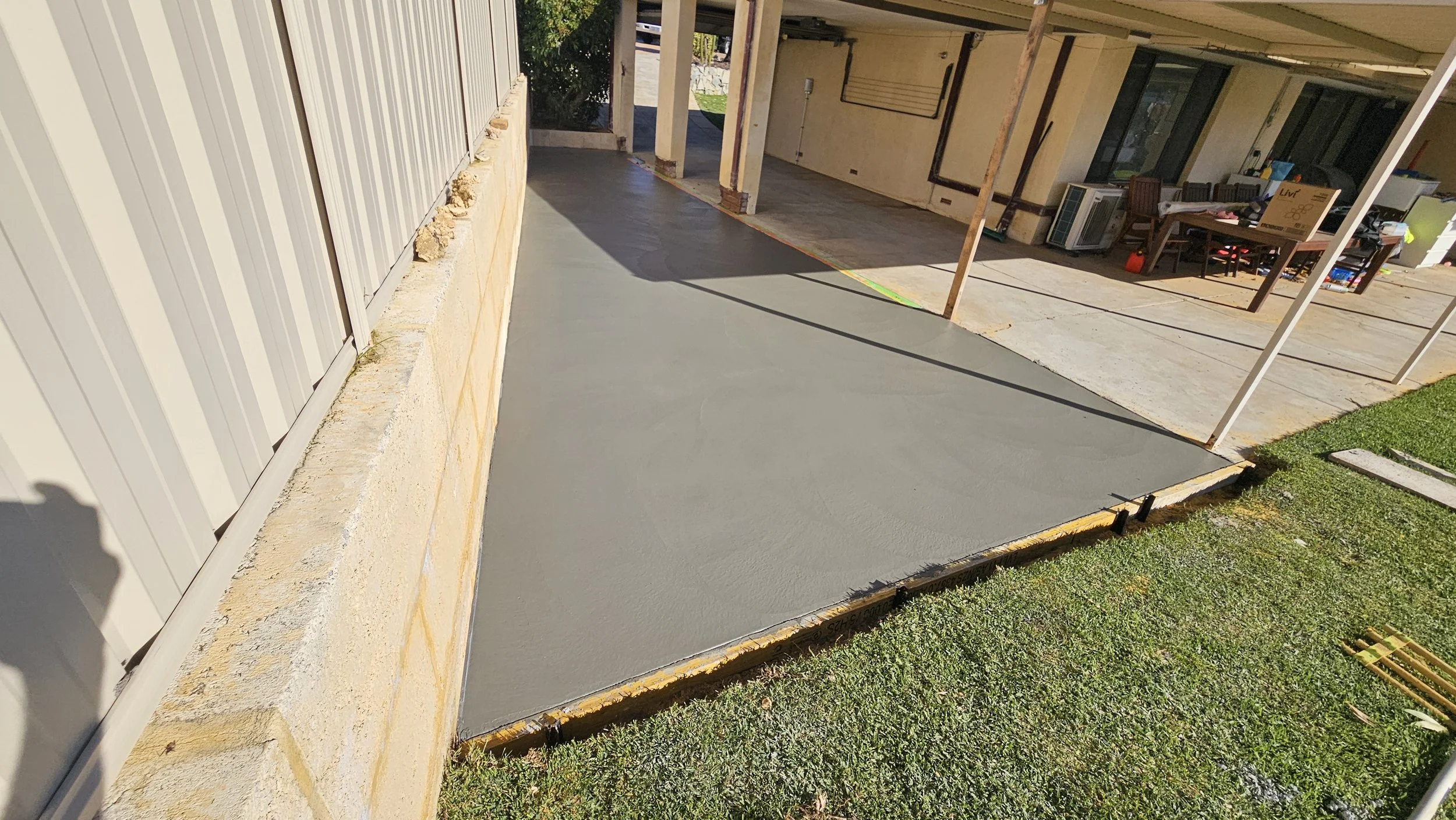 Grey concrete alfresco and patio in Spearwood