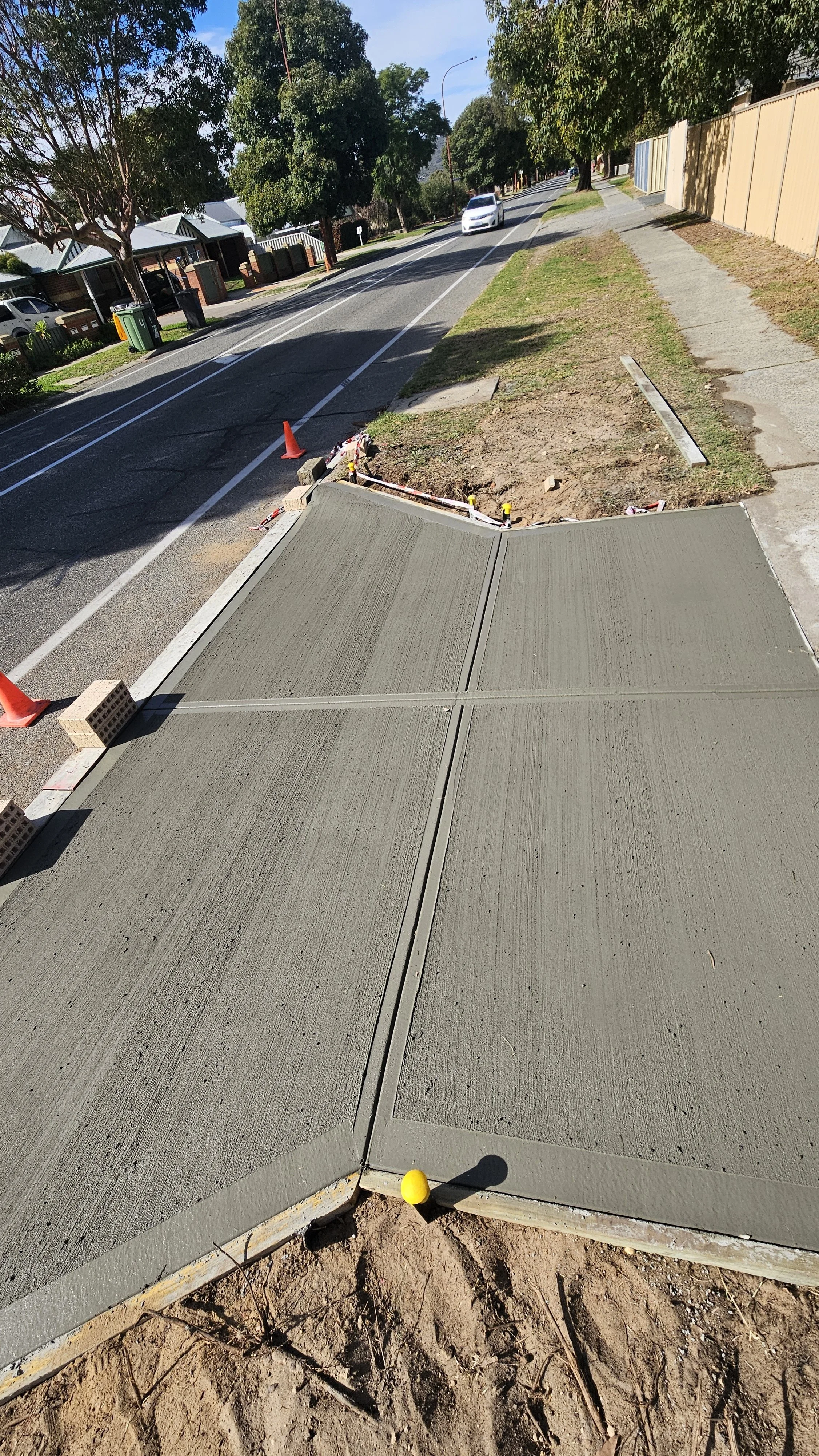 Grey concrete crossover replacement in Gosnells