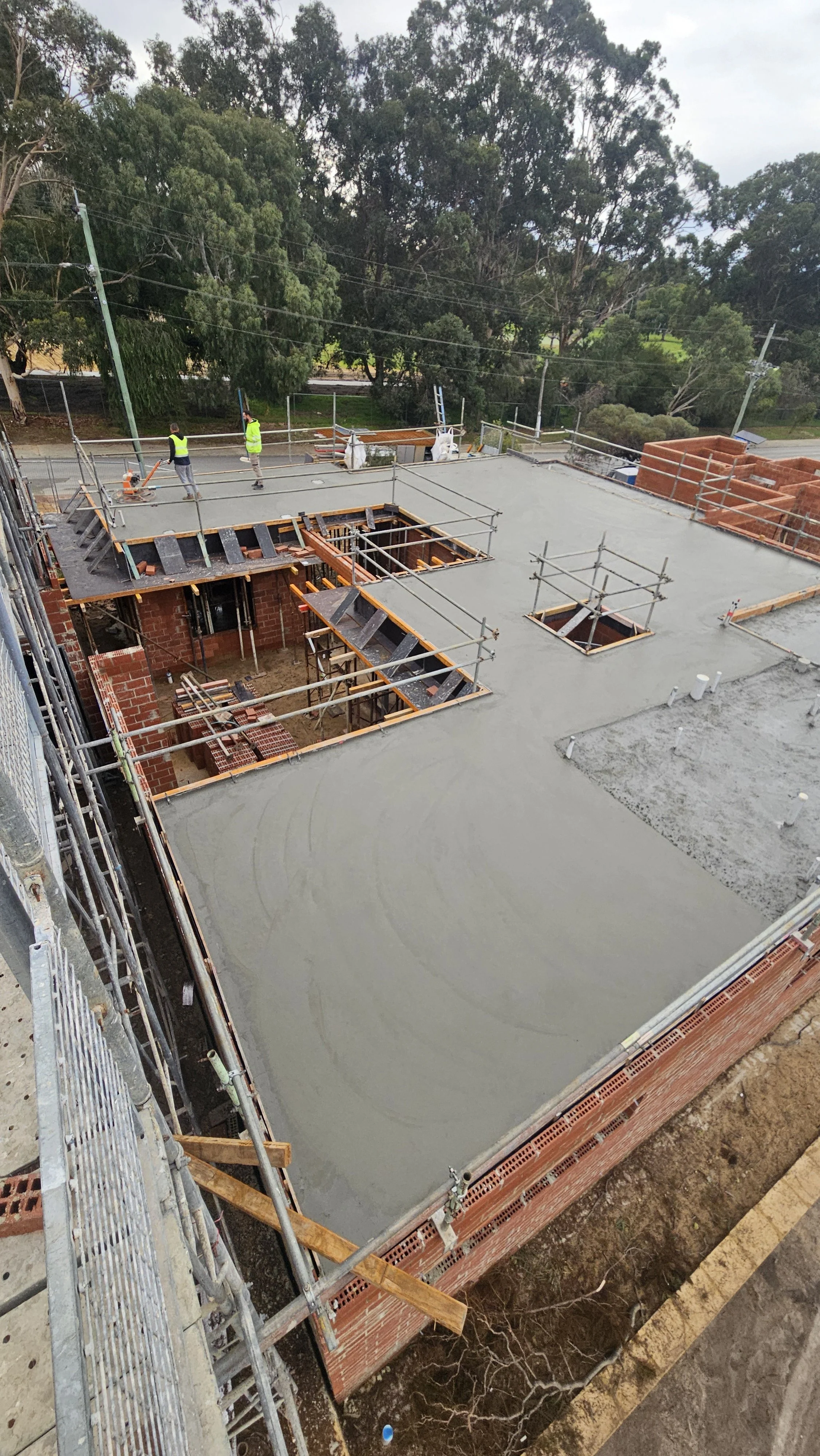 freshley poured grey concrete structural slab to suspended slab in Yokine