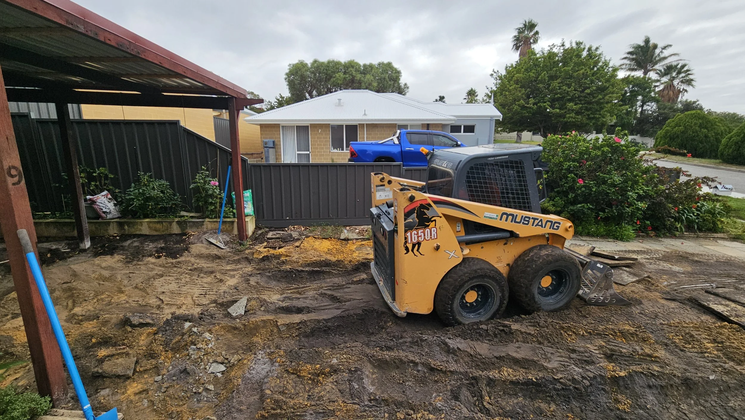 Bobcat on site removal of old concrete driveway in Eden Hill