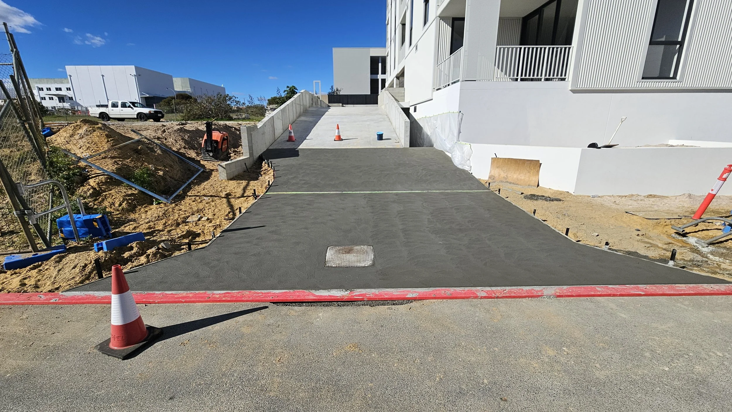 Commercial apartments crossover with grey concrete in north coogee