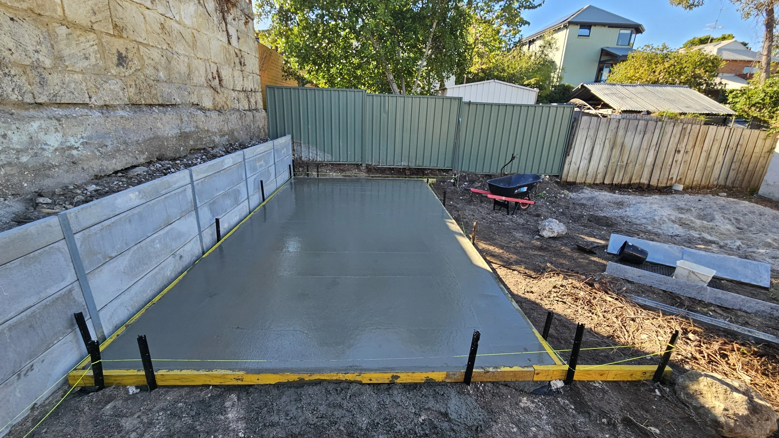 Grey concrete shed slab pour in Fremantle