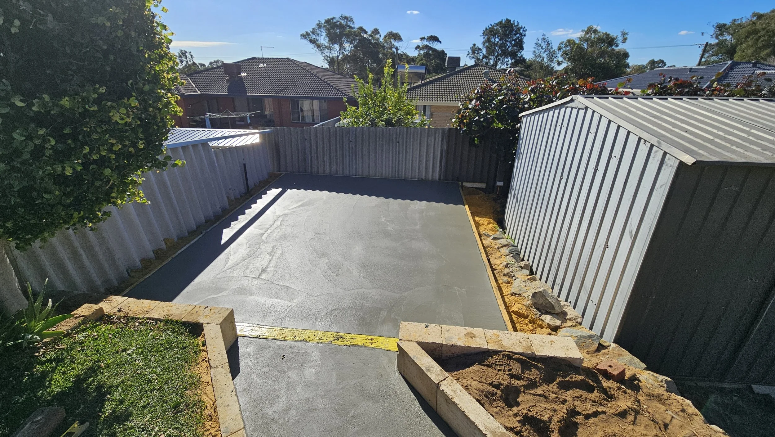Grey concrete shed slab in Spearwood