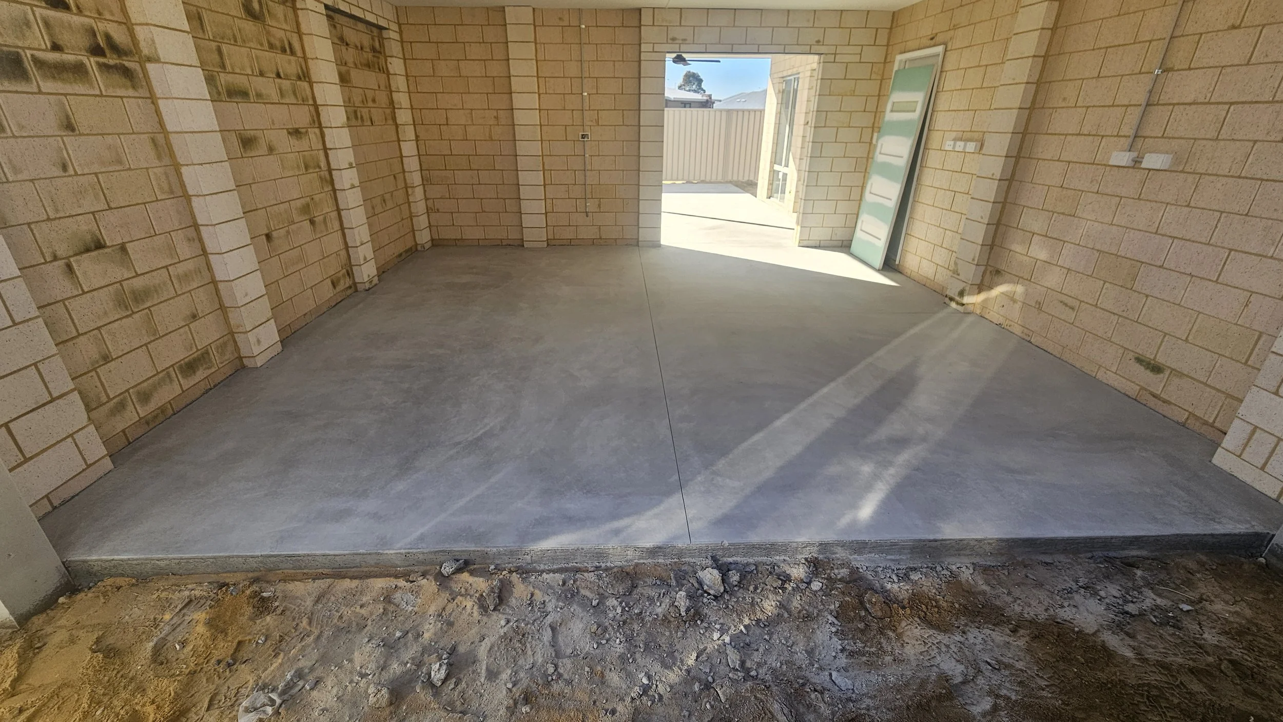 grey concrete garage with lines cut in Southern River