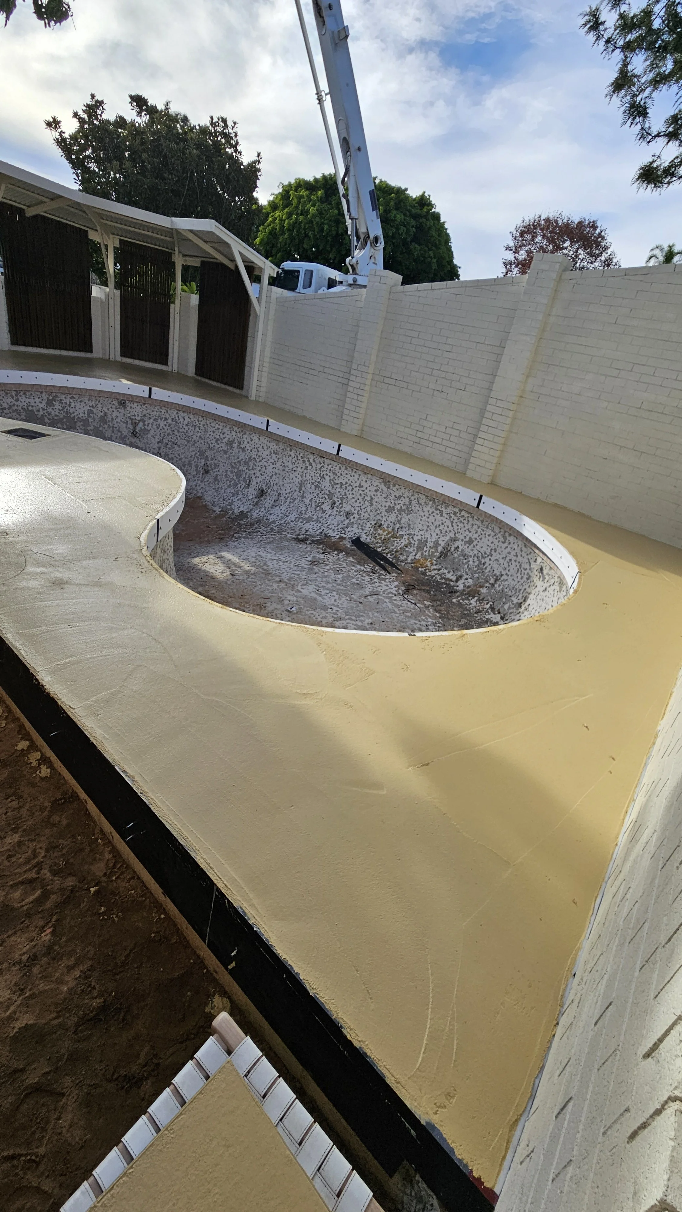 freshley poured liquid limestone to pool surrounds in Bicton