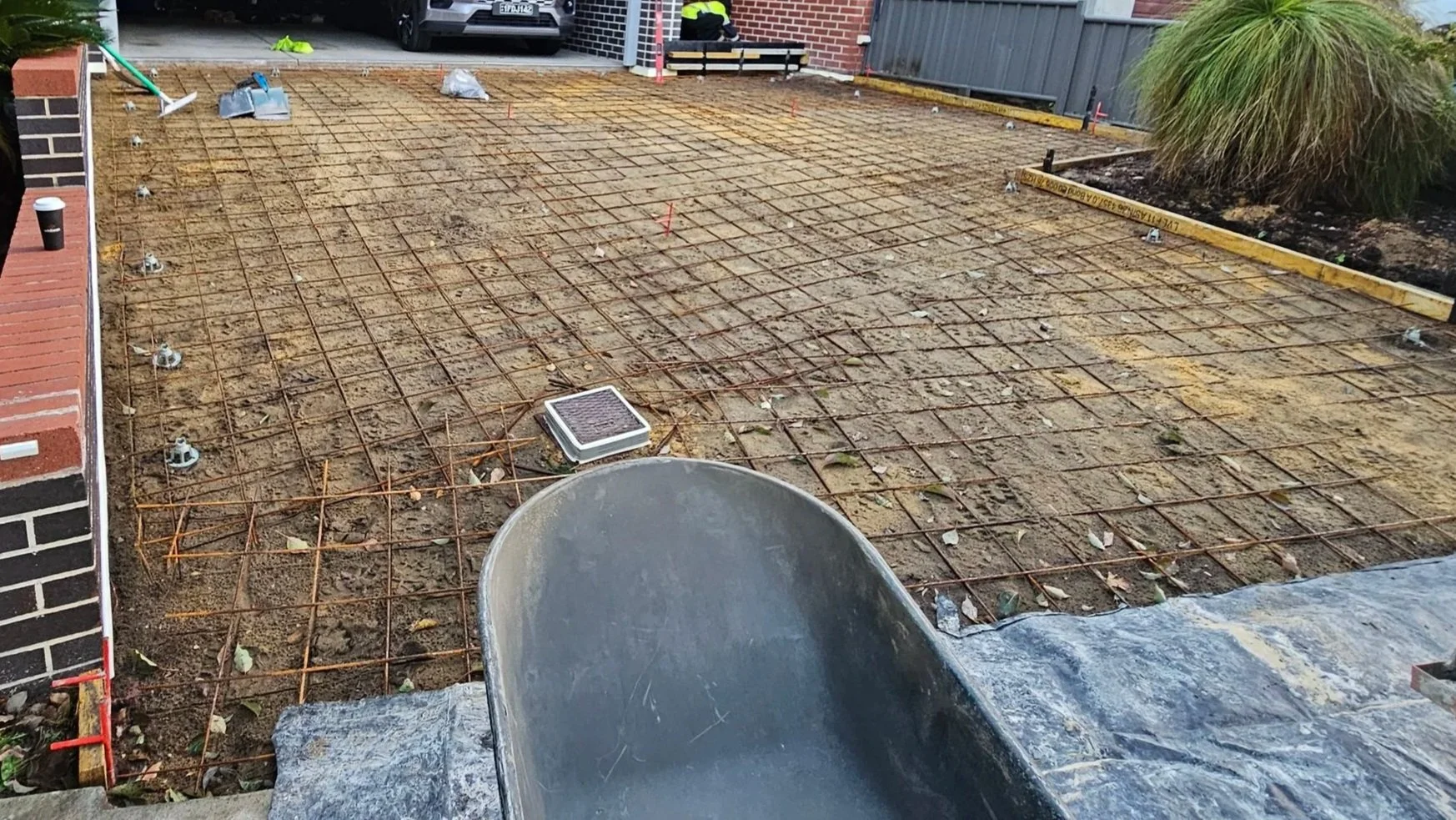 site preparation and reinforcement for concrete driveway in North Perth