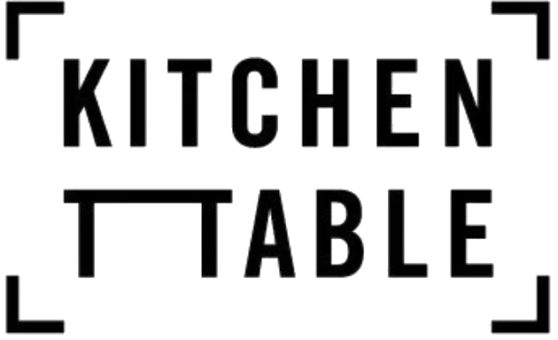 Text reading "Kitchen Table" in graphic design style.