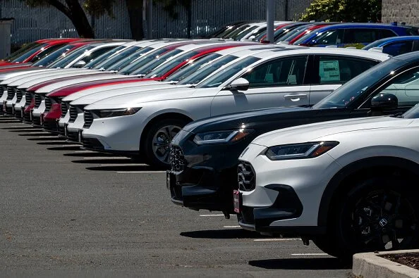 Vehicles for sale at an AutoNation Honda dealership in Fremont, California. Getty Images.