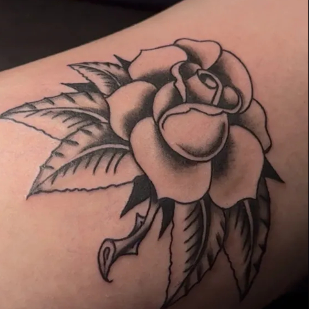 Traditional Black and White Rose Tattoo.png