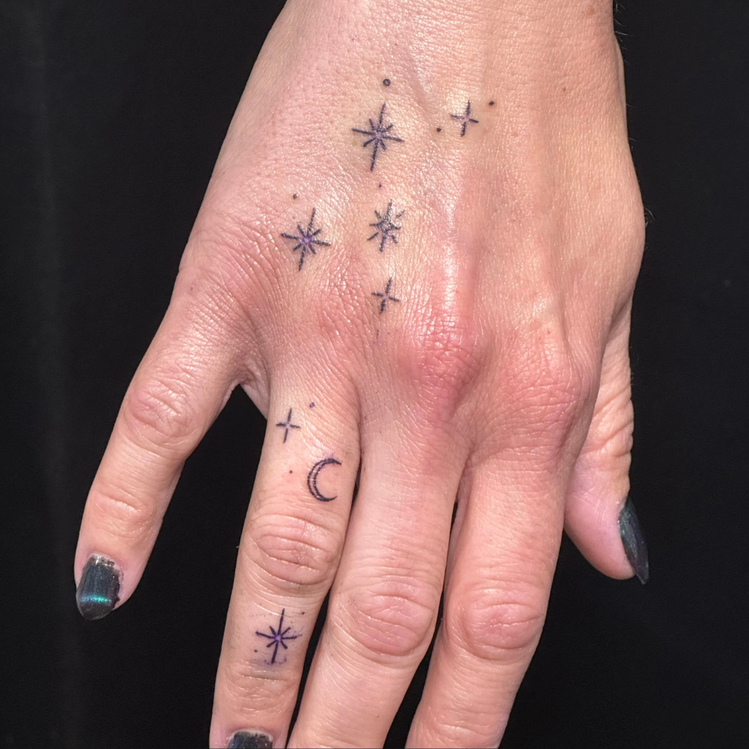 Fine Line Sparkle Star Crescent Moon Hand Tattoos.png