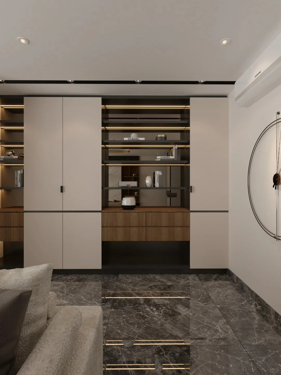 Modern living room with built-in shelves, decorative items, and a marble floor.