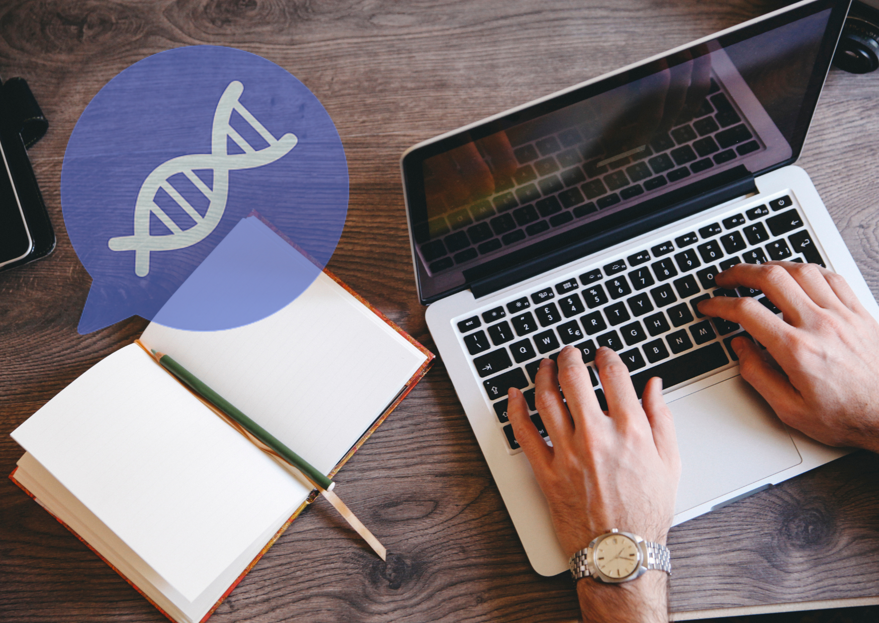 A person typing on a laptop keyboard with a notebook and a pen nearby on a wooden table. There is a digital illustration of a DNA double helix in a speech bubble overlayed in the image.