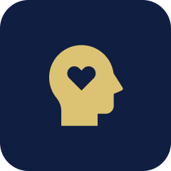An icon of a human head profile with a heart shape inside the head, on a dark background.