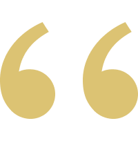 Golden quotation marks on a black background.