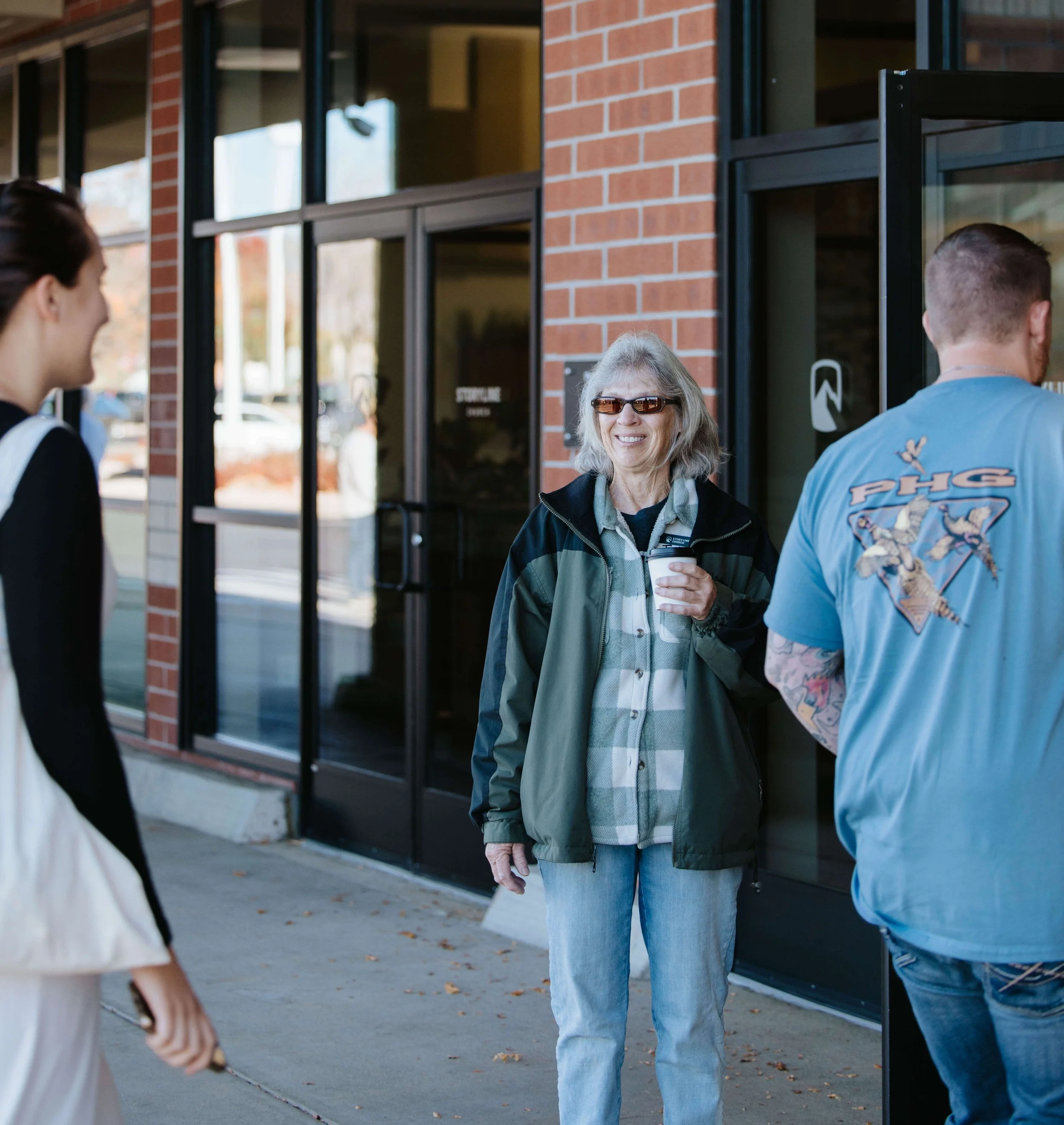 A multigenerational church welcoming people to their building at 64th and Indiana 