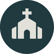 Church with a cross on top, featuring two side entrances or wings.