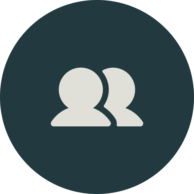 Icon of two overlapping generic user profiles, representing social or user accounts.