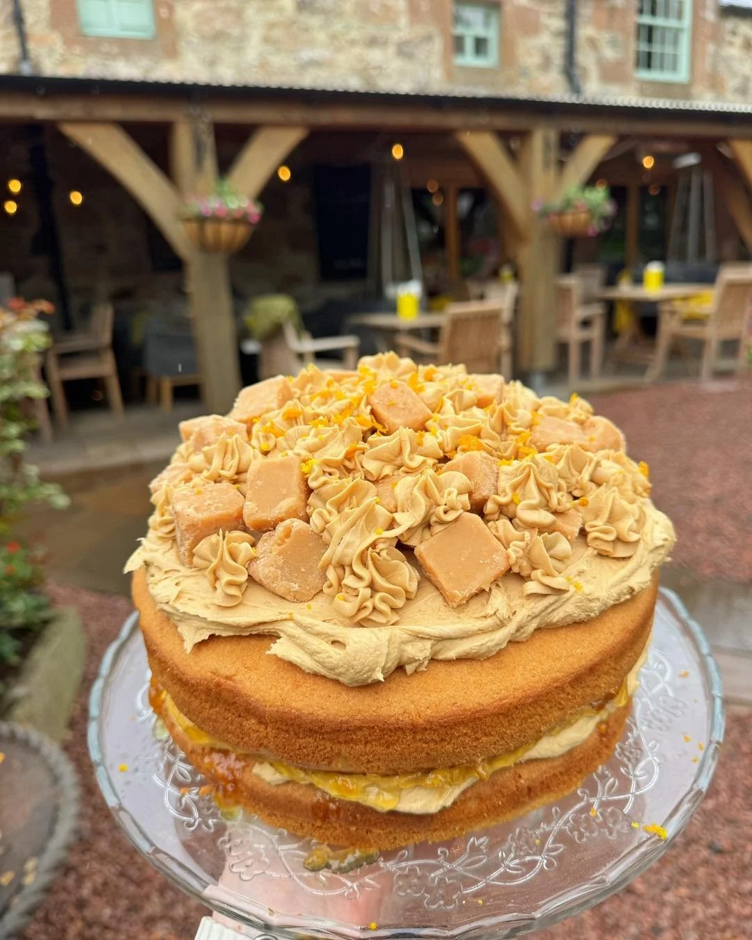 Flying off the cake counter today 👀🍊

Tablet &amp; Orange Marmalade Cake 🤍

Light vanilla sponge layered with orange marmalade and tablet buttercream, then topped with plenty more buttercream and chunks of Scottish tablet 🐻

Sweet, buttery and ju