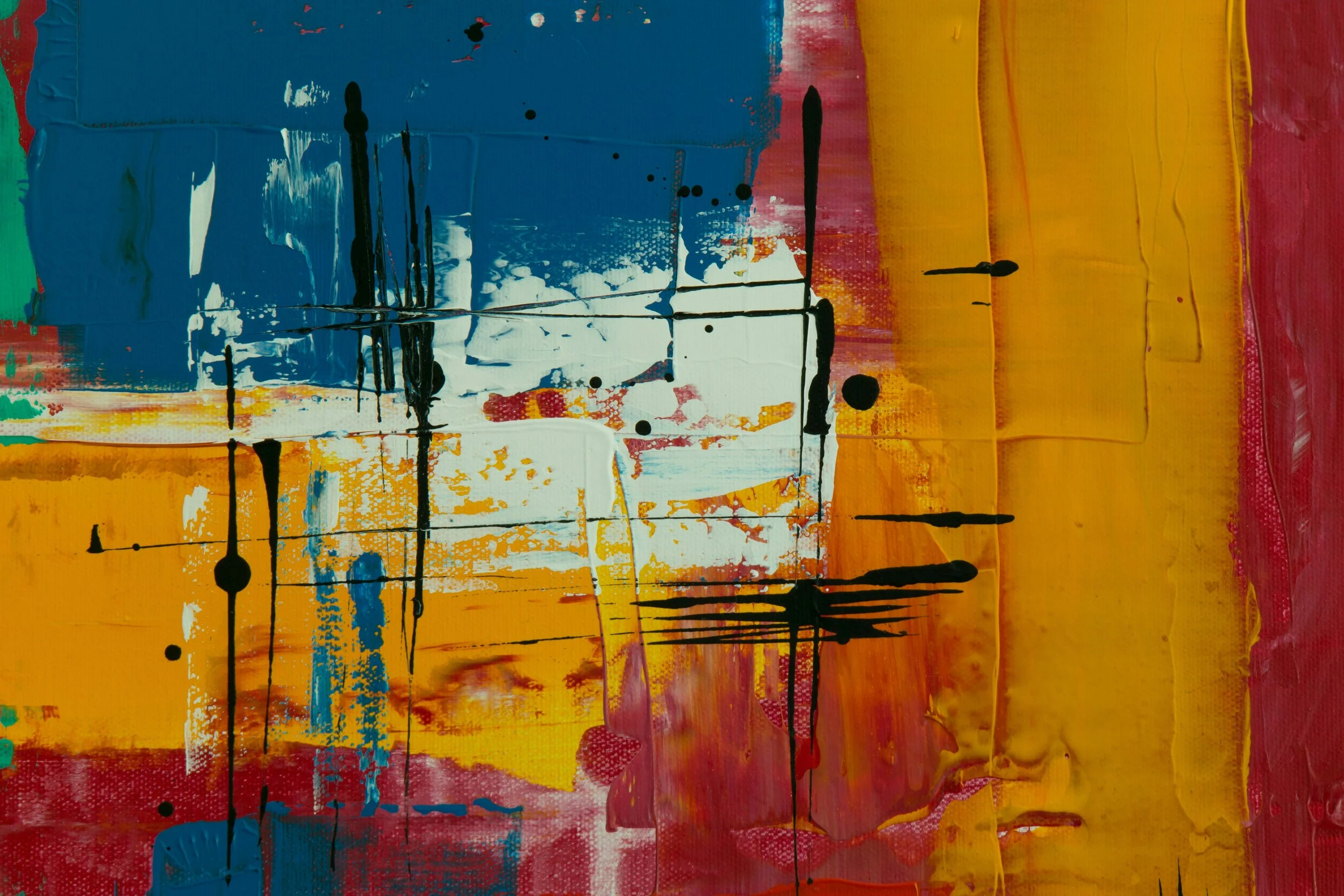 Abstract artwork in yellow and blue paint