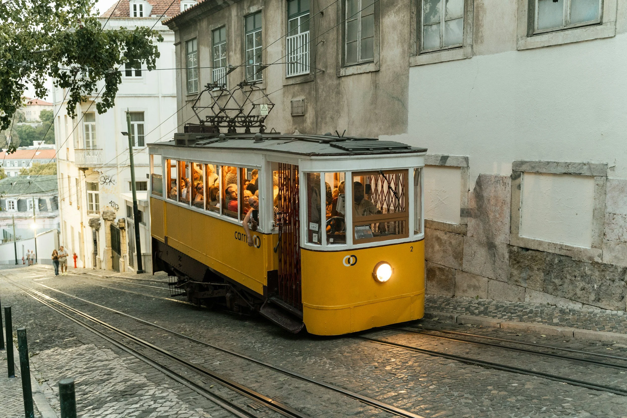Lisbon tram 28 historic yellow tram street