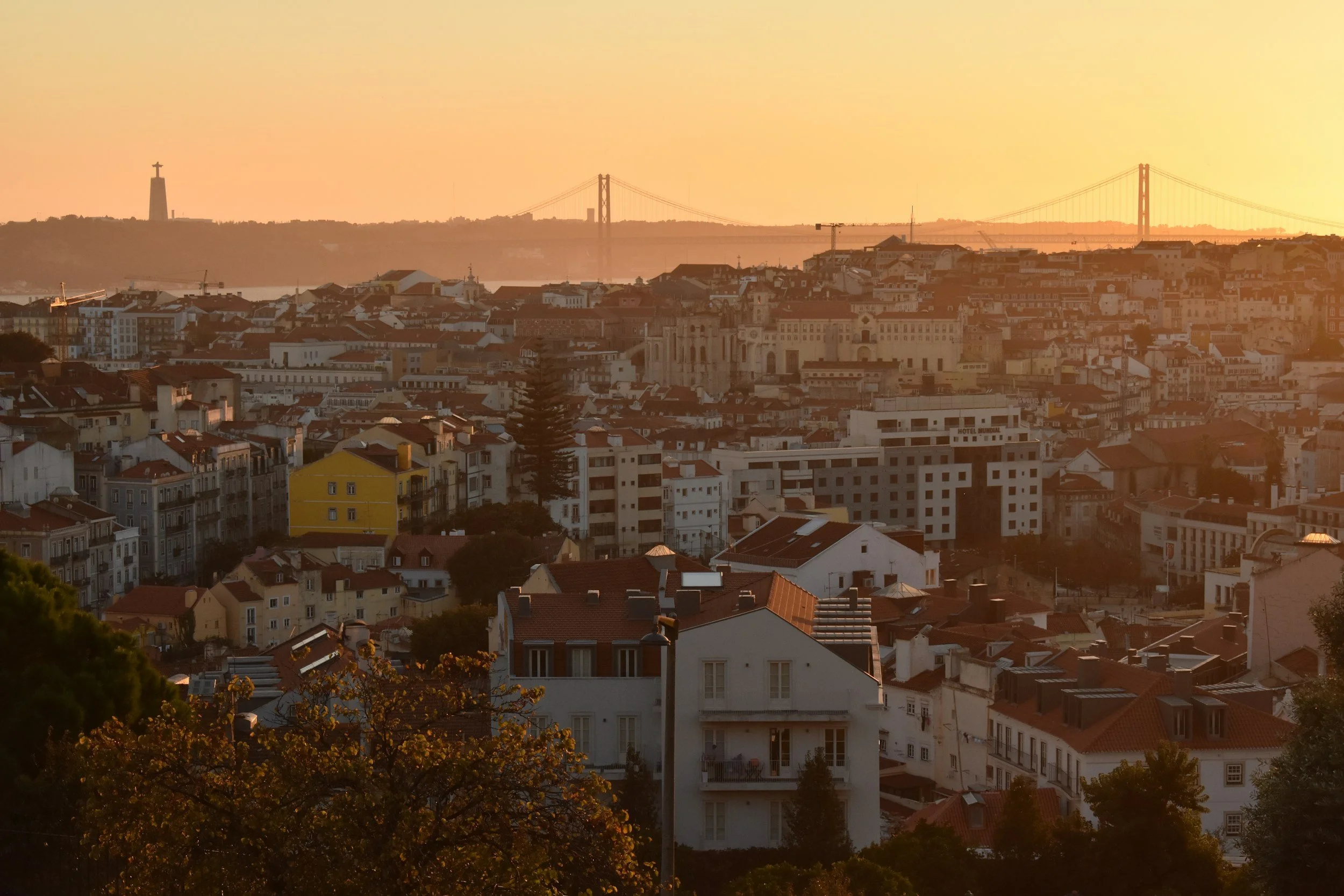 Lisbon viewpoint sunset skyline