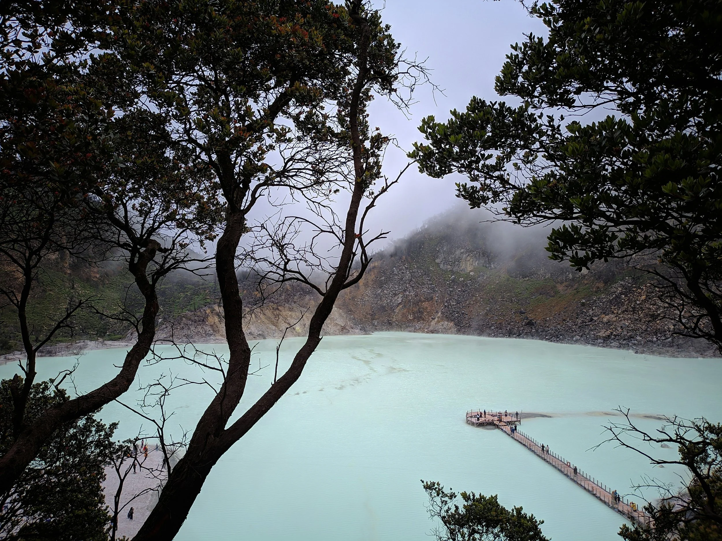 Turquoise Kawah Putih crater lake in Bandung Indonesia