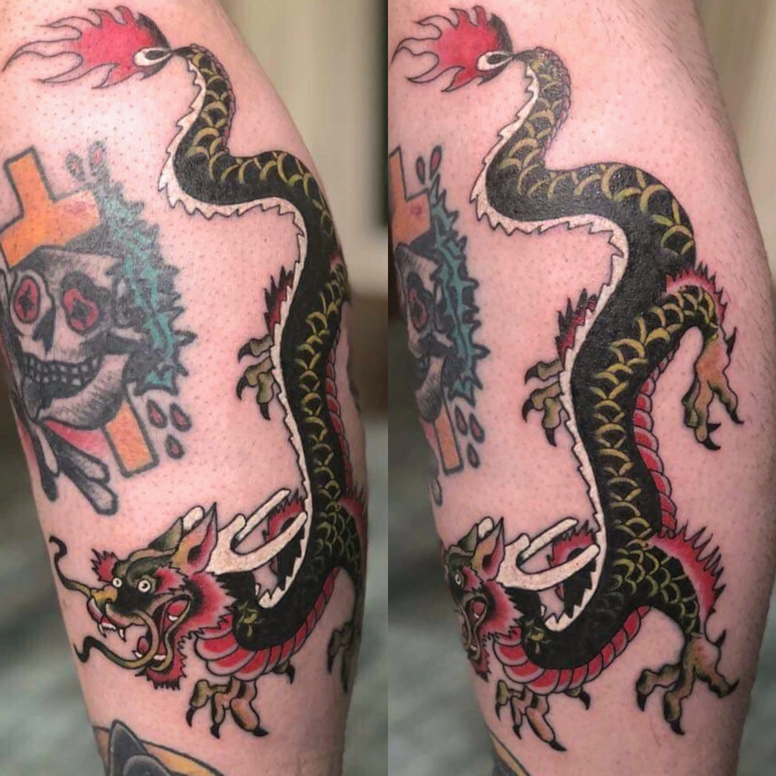 Tattoo of a traditional Asian dragon with a black body, red accents, and yellow details on a person's leg, with other smaller tattoos visible around it.