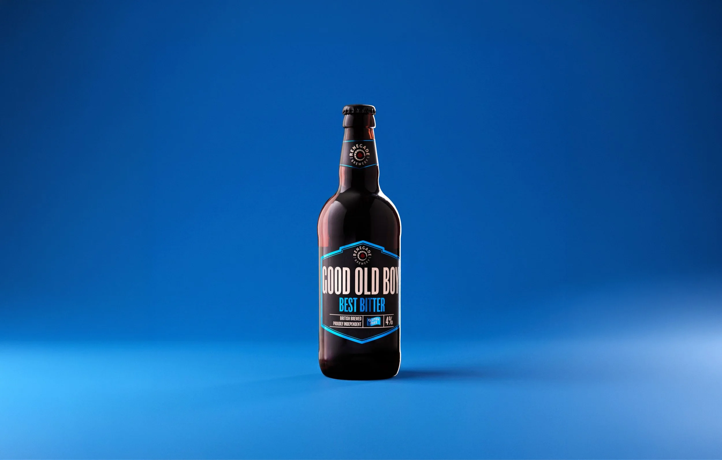 A dark brown beer bottle with a blue and black label that reads "Good Old Boy" and "Best Bitter" against a blue background.