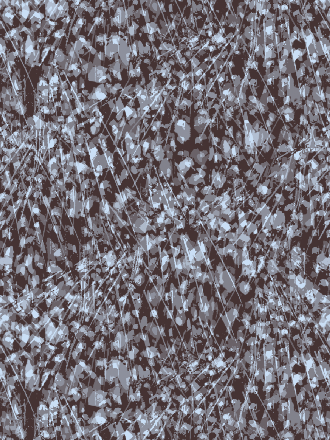 Close-up of a shattered glass surface with numerous small, irregularly shaped fragments and lines.