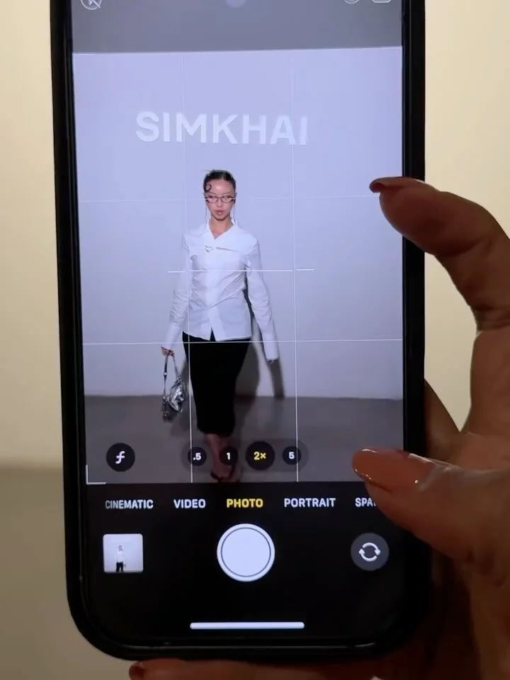 @erica.syl, our 9-5 corporate baddie and 5-9 creator, at the SIMKHAI show during NYFW with hair styled by @tresemme 💼✨💅🏻