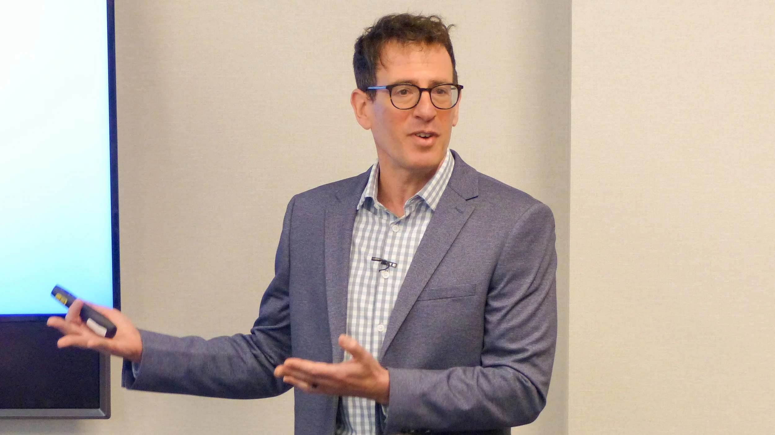 Keynote speaker Dr. Gregory Charlop, MD, DipABLM speaking at a conference with Houston Methodist in Texas