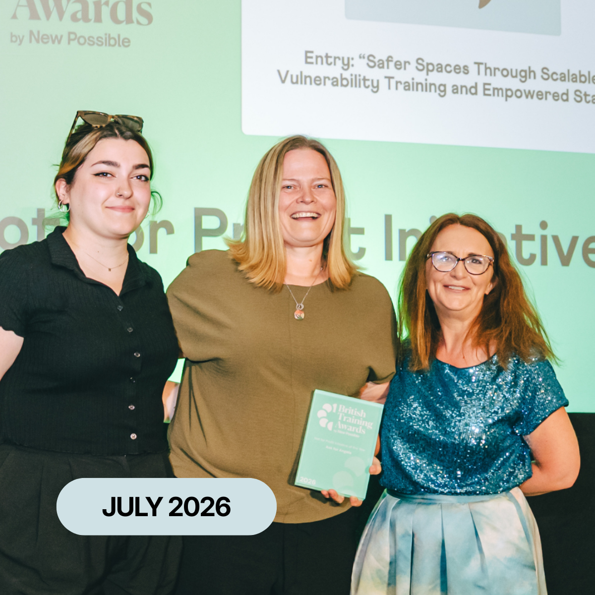 The Ask for Angela team collecting their award for not-for-profit of the year at the British Training Awards