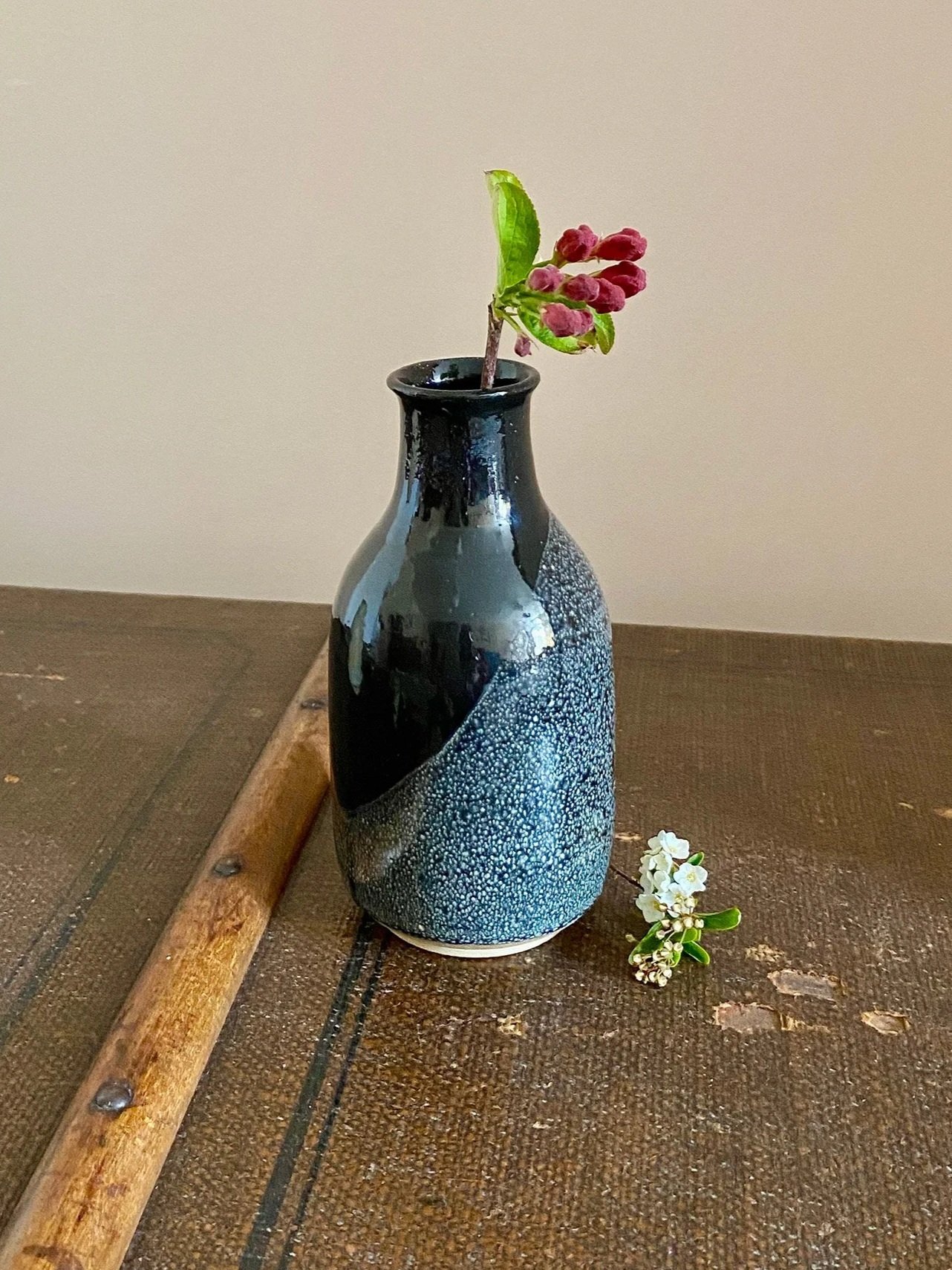 Glossy black bottle vase