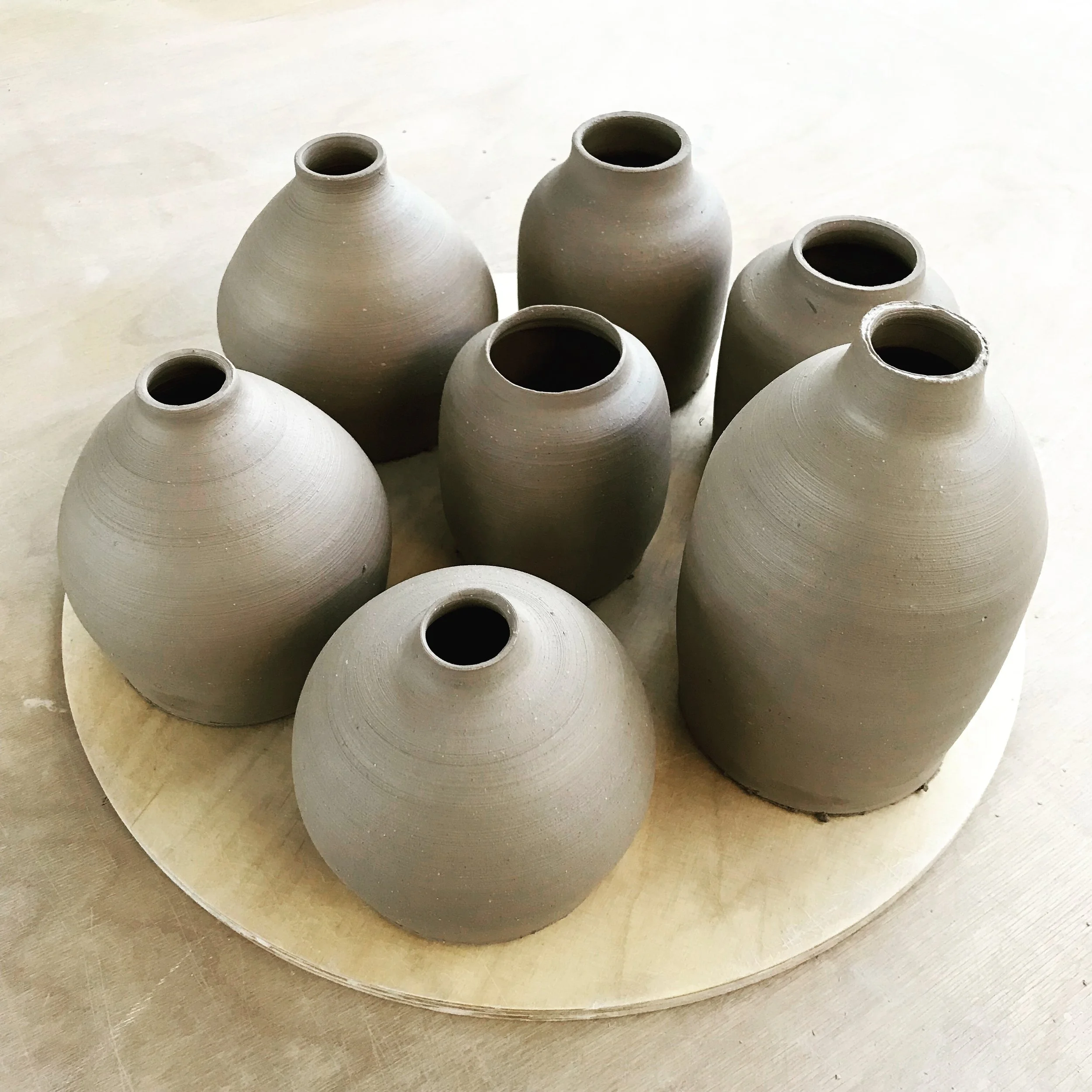 handmade clay bottles and vases