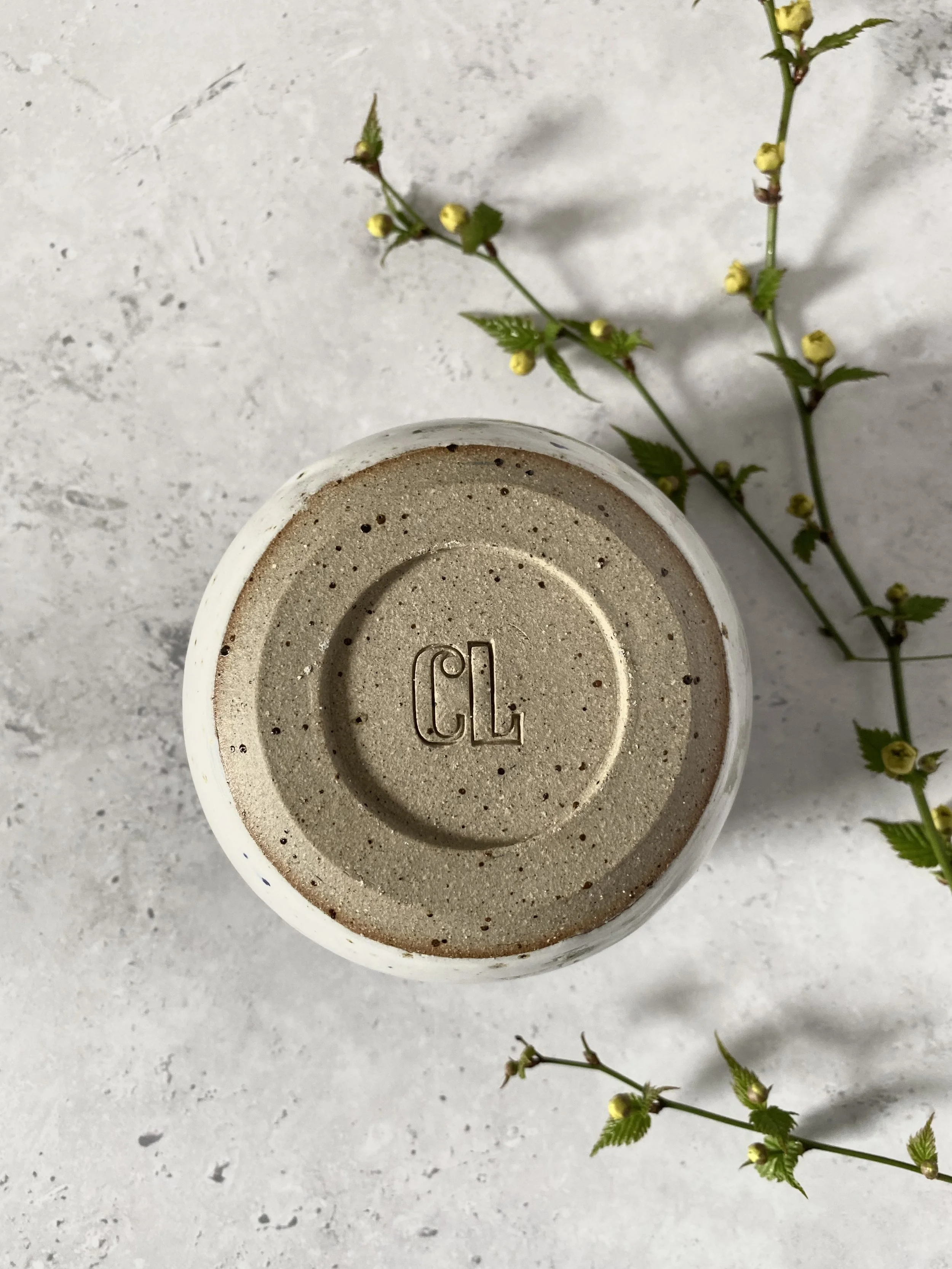 bottom of cup with stamp on