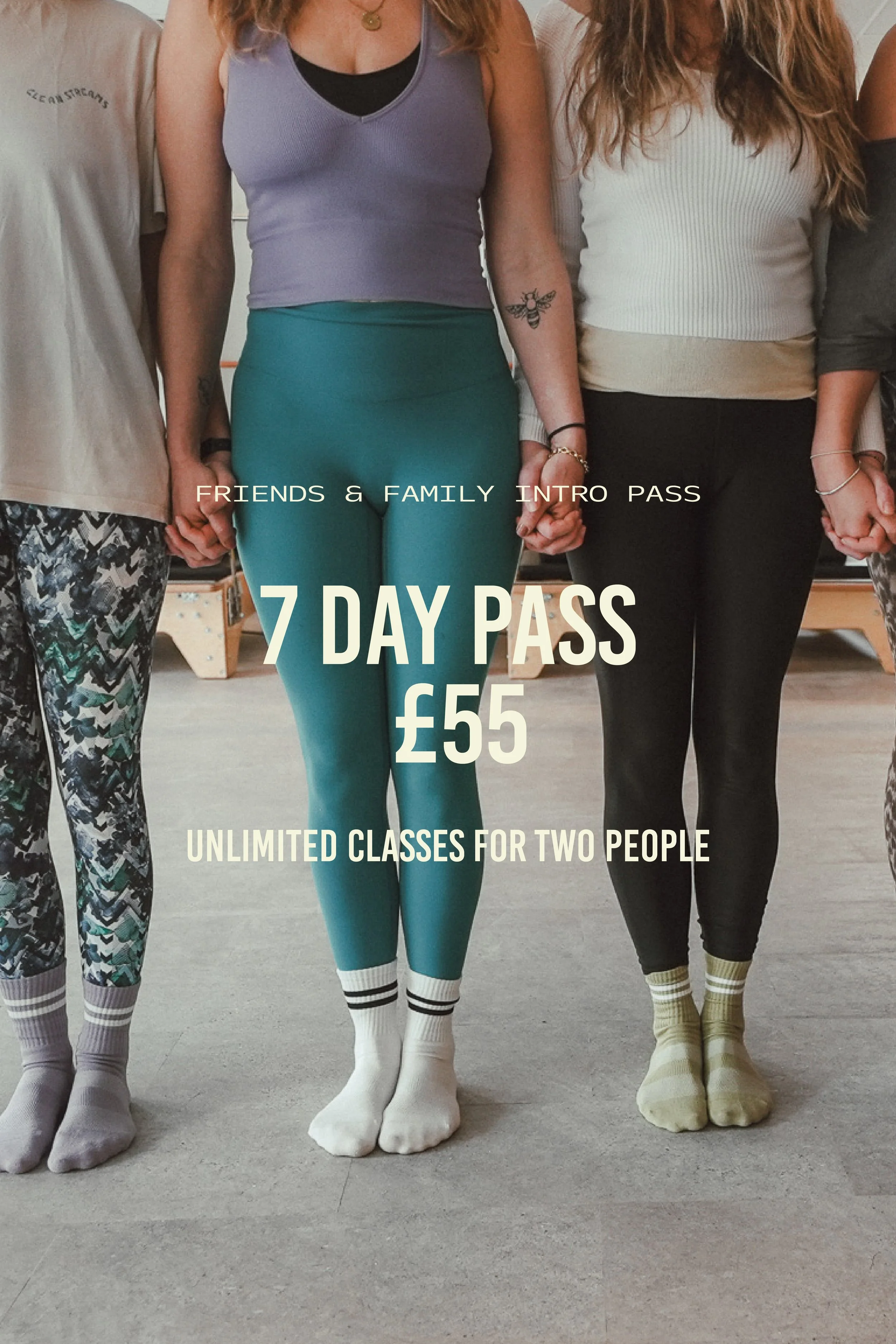 A group of four people standing arm-in-arm holding hands. They are wearing colorful workout clothes and socks. The text overlay advertises a 7-day fitness pass for two people at £55, with unlimited classes.