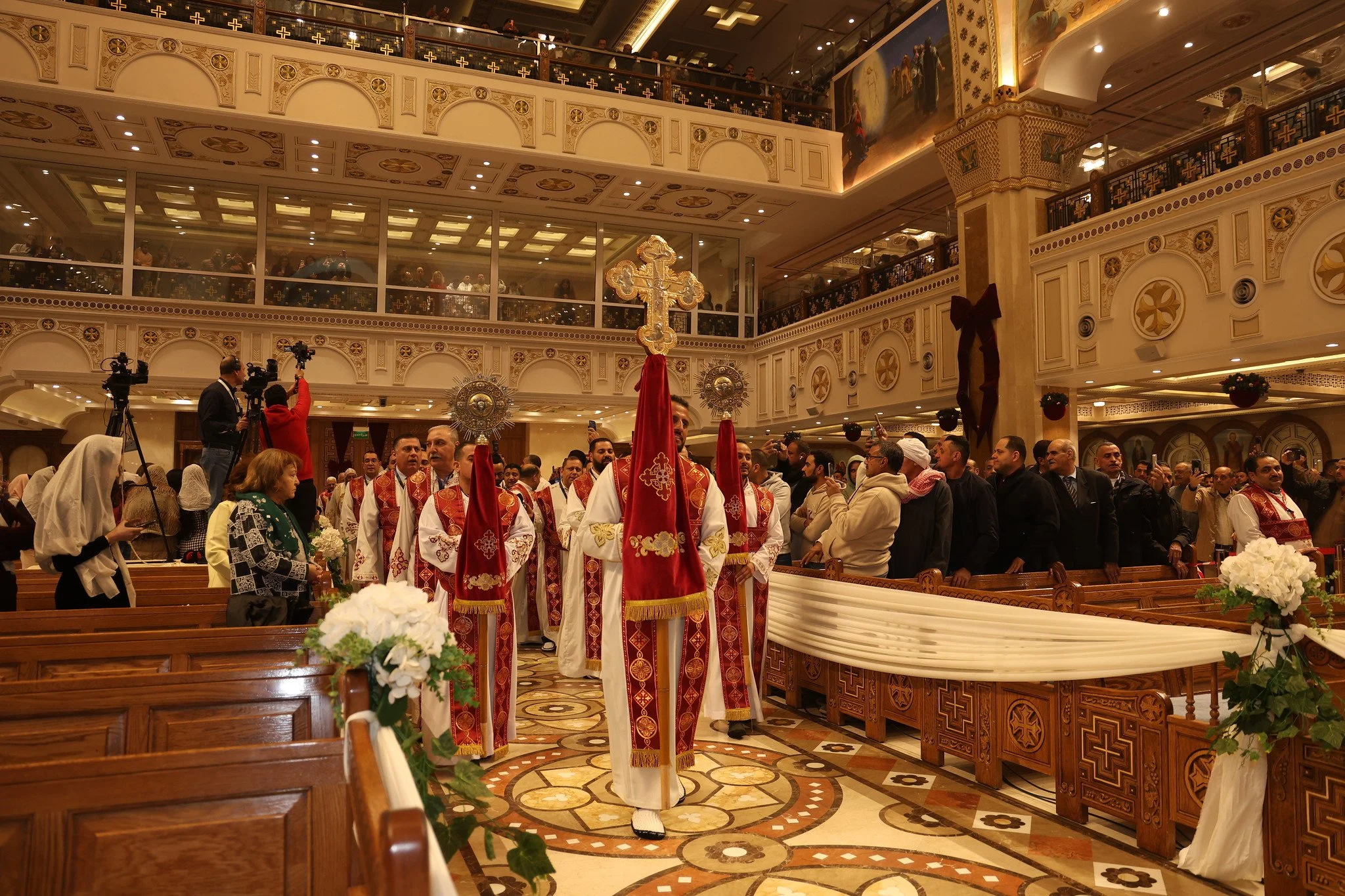 Coptic Orthodox Deacons holding Cross processions during liturgy