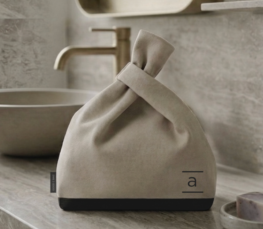 good-e-bag. Luxury beauty goodie bag made from GOTS-certified organic canvas in the style of a knot bag with personalised initials. A gift for girls' weekends, hen parties, milestone birthdays, friend reunions, romantic breaks and retreats.