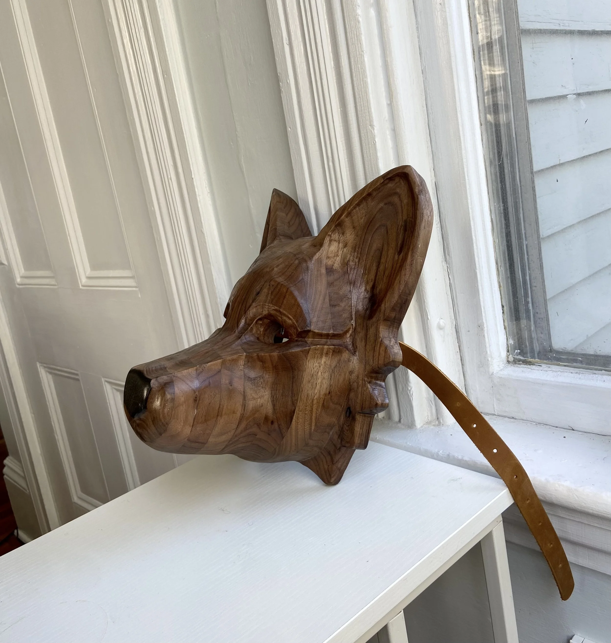 	
Wolf therian mask wood carving