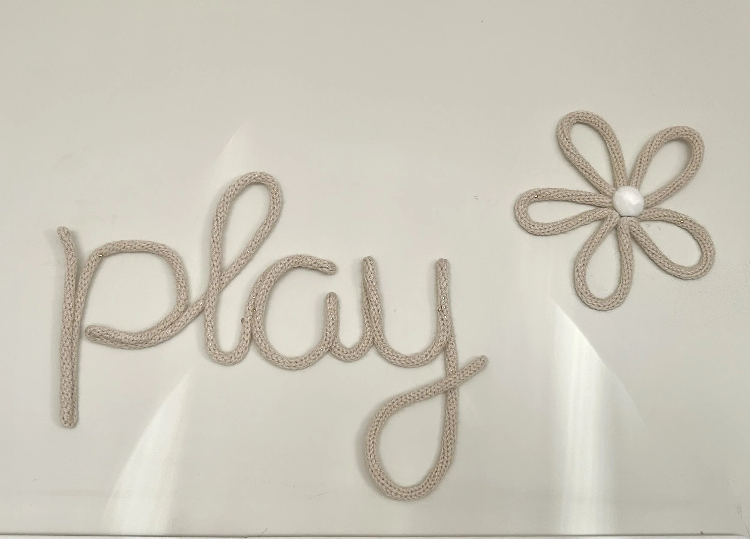 Wire 'Play' Sign