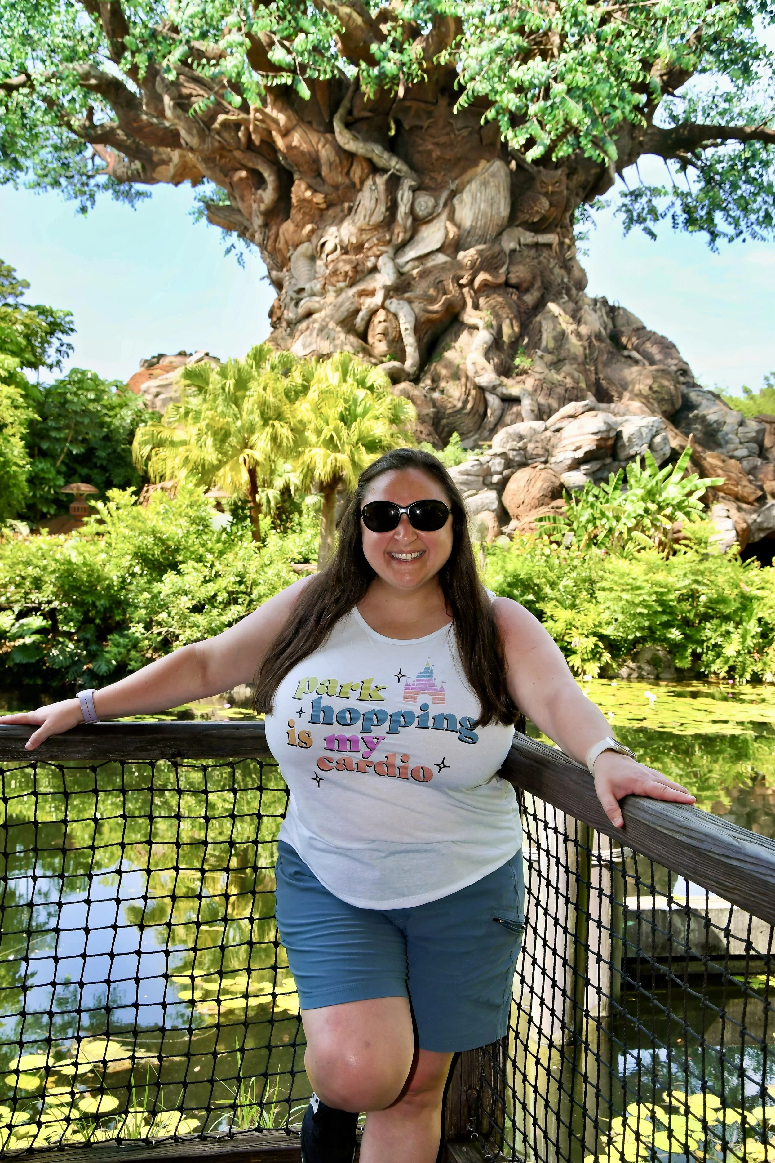 Tanya Hartman at Disney with a 'park hopping is my cardio' tee.