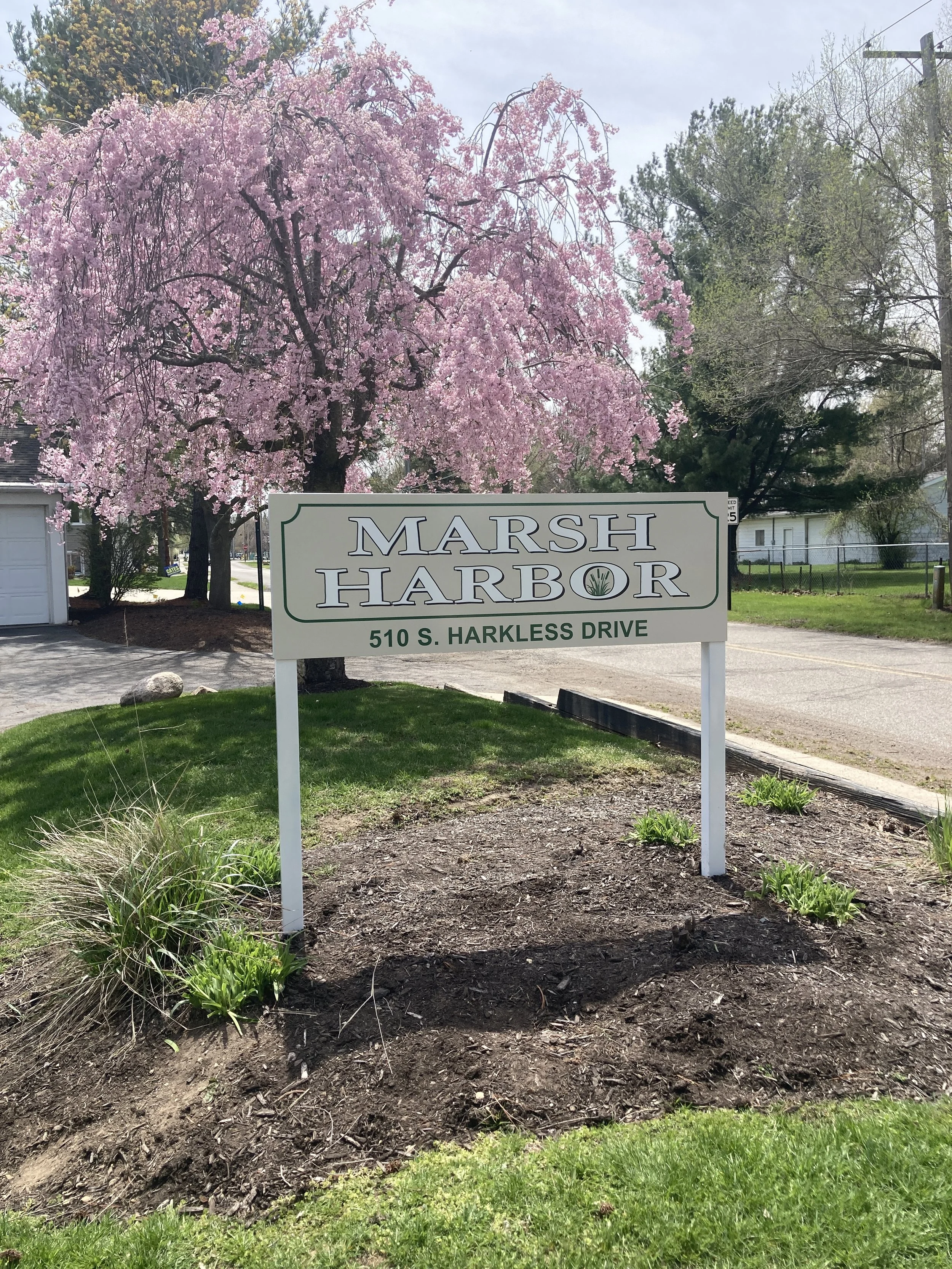 Post and panel sign marsh harbor condominiums syracuse indiana