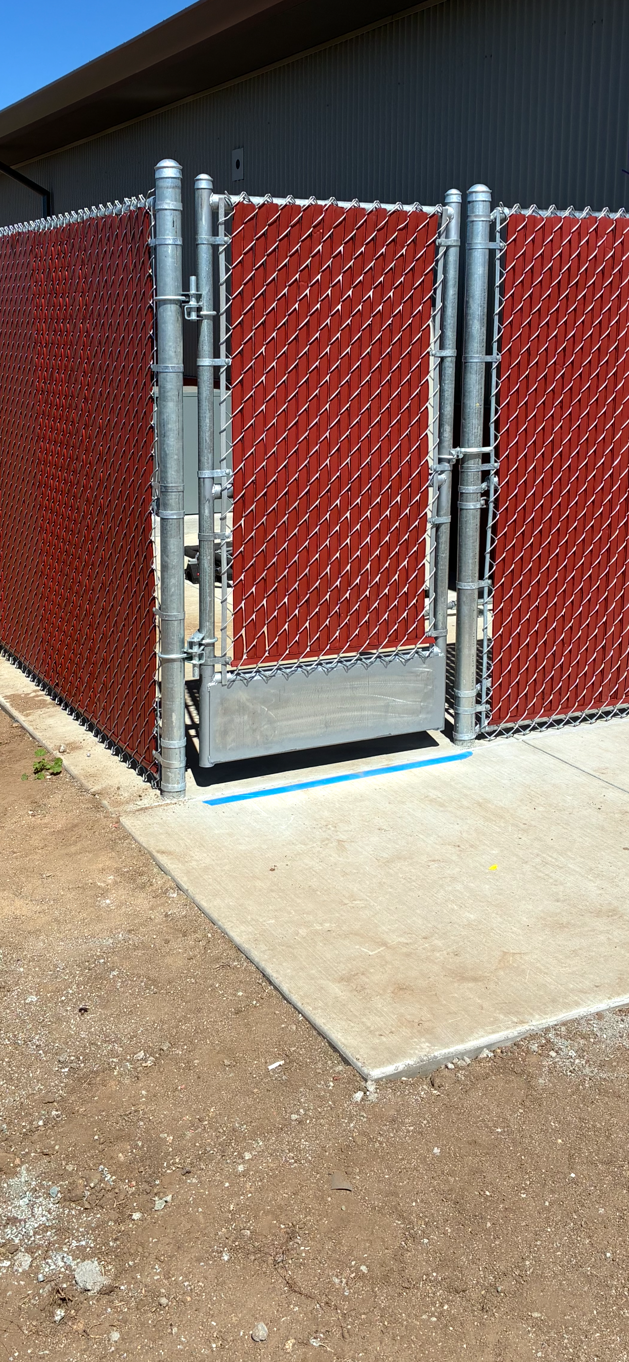 Chain link swing gate with privacy slats for secure entry access