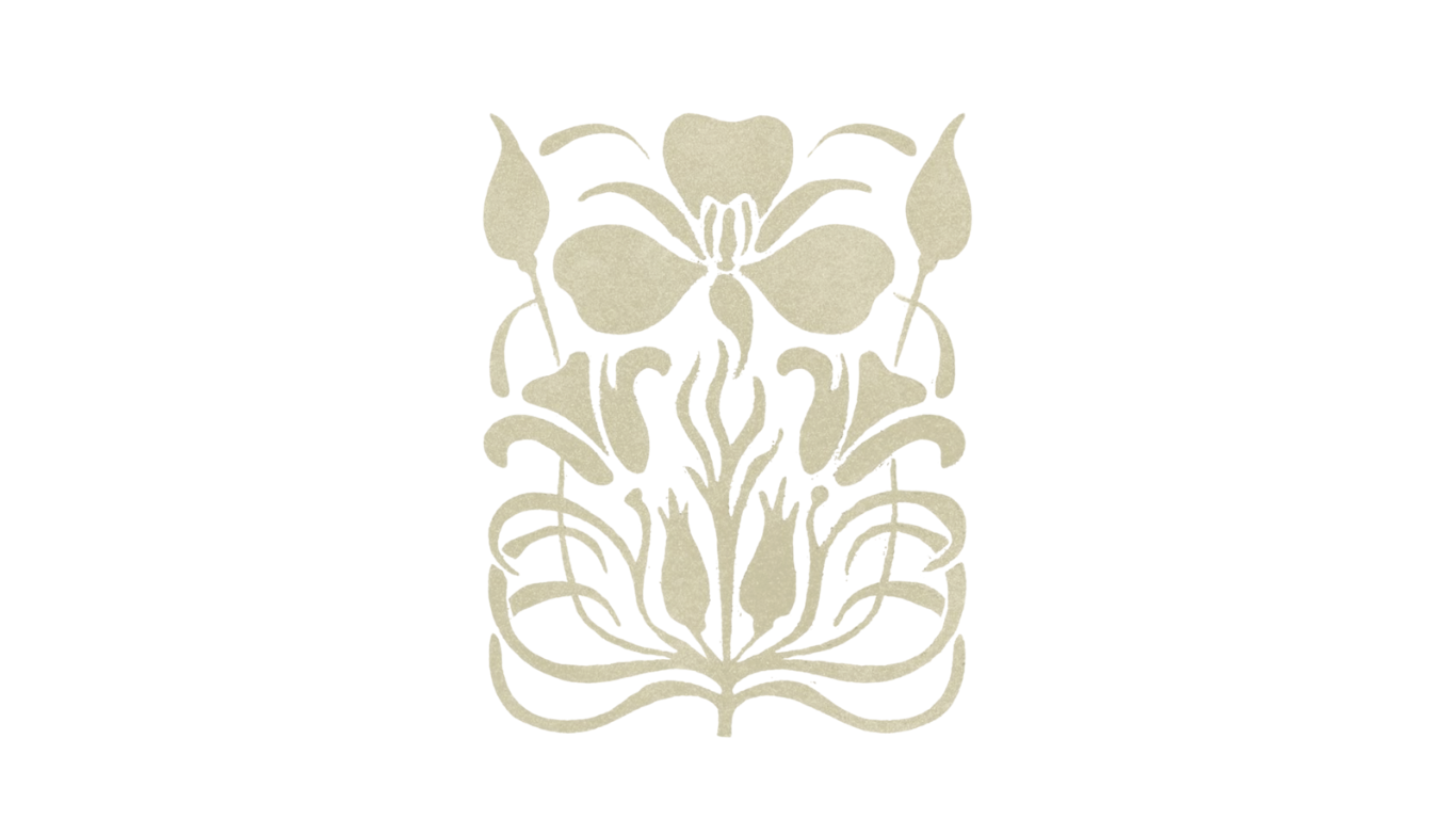 A gold-colored decorative convenience store sign with a rose-shaped emblem and an attached beige rectangular panel.